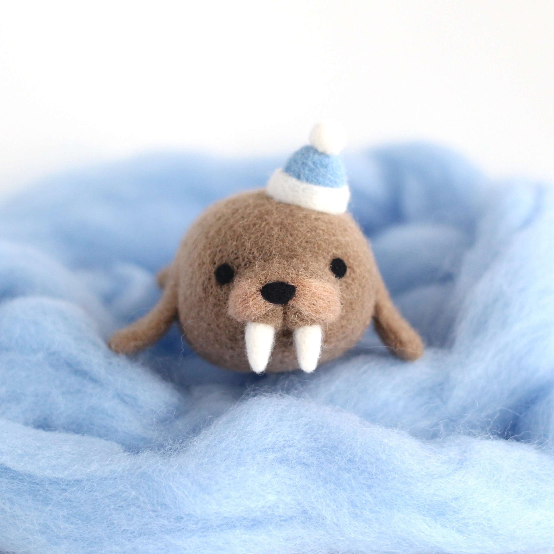 Needle Felted Walrus with Blue Hat by Wild Whimsy Woolies