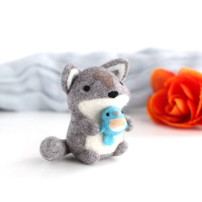Needle Felted Wolf holding Bluebird by Wild Whimsy Woolies