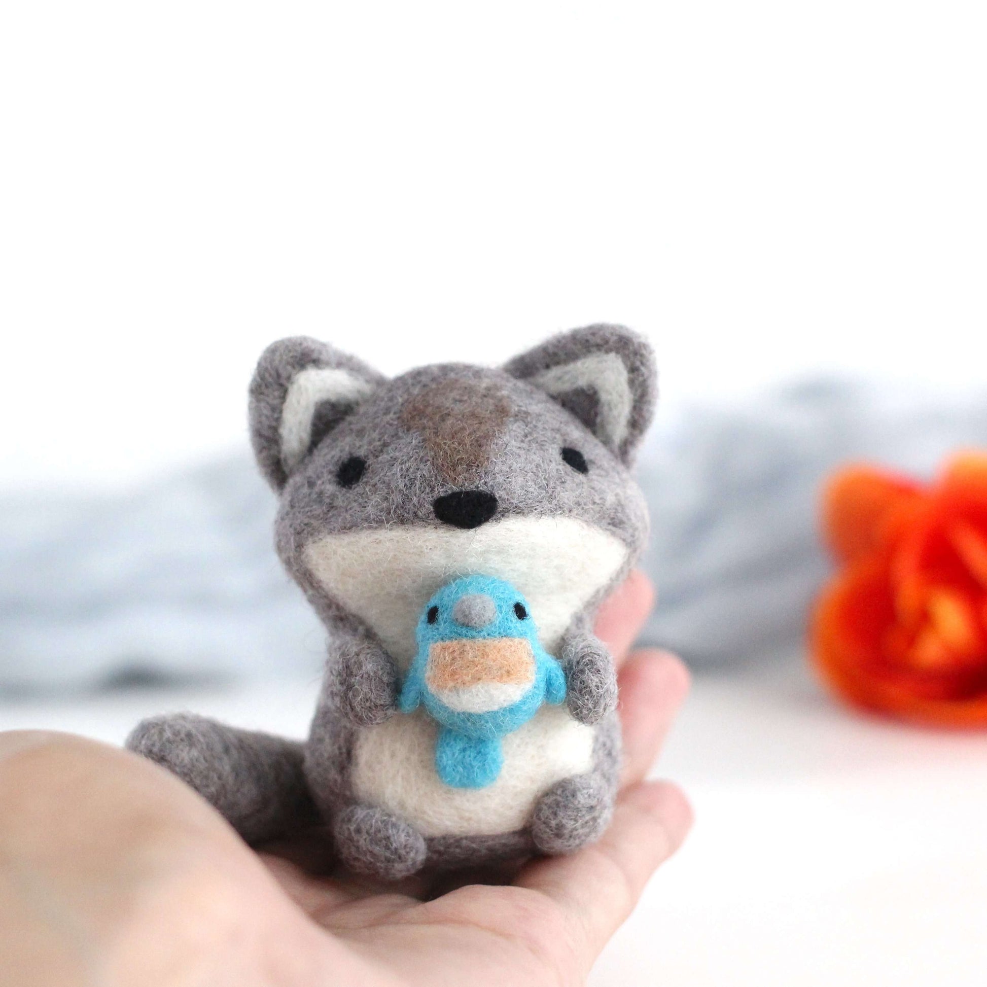 Needle Felted Wolf holding Bluebird by Wild Whimsy Woolies
