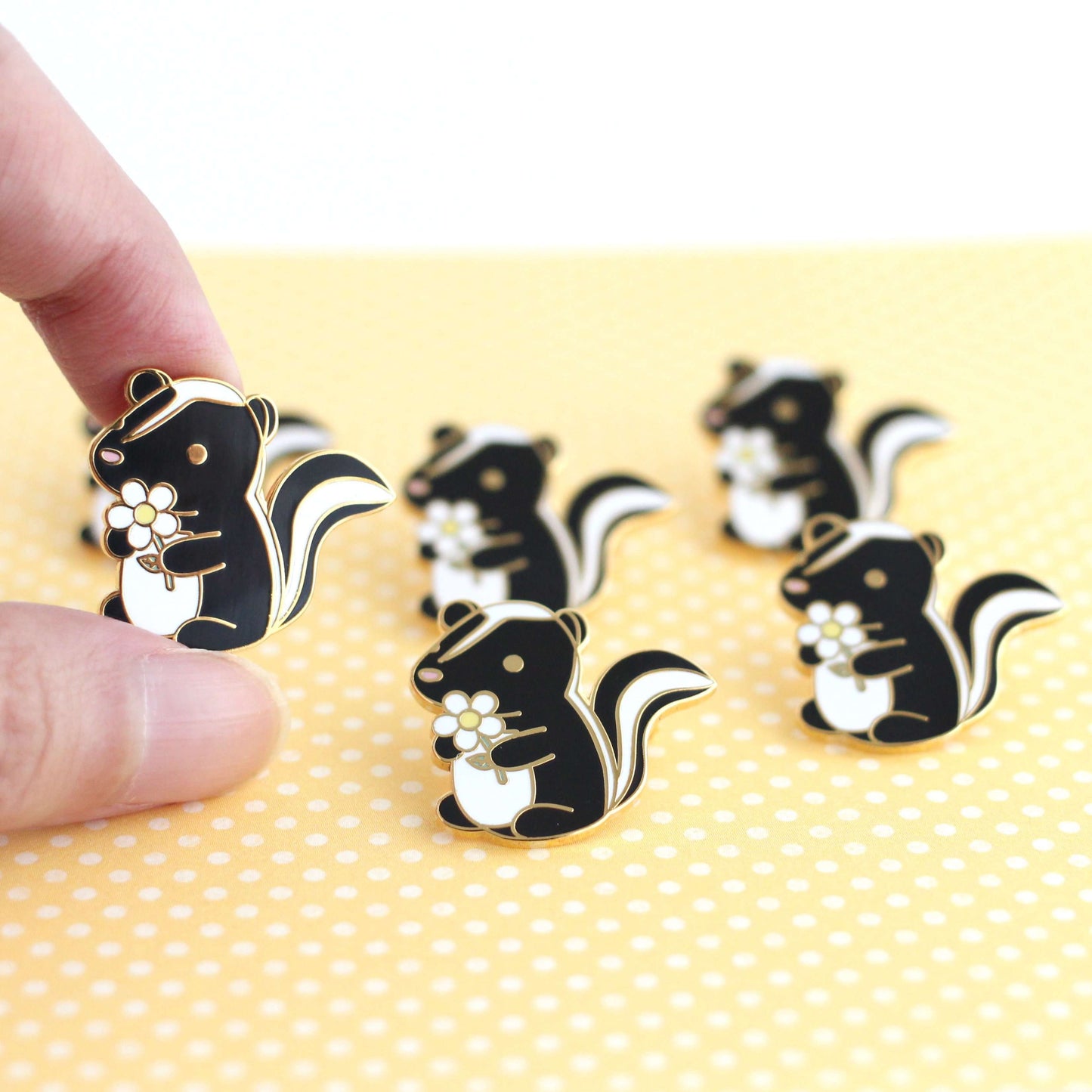 Skunk and Daisy Enamel Pin (Black Variant) - Cute Skunk Pin by Wild Whimsy Woolies